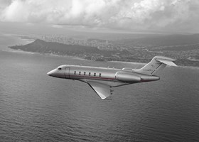 Challenger 350 flying over mountains