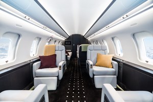 Interior of the Challenger 650 with dining area