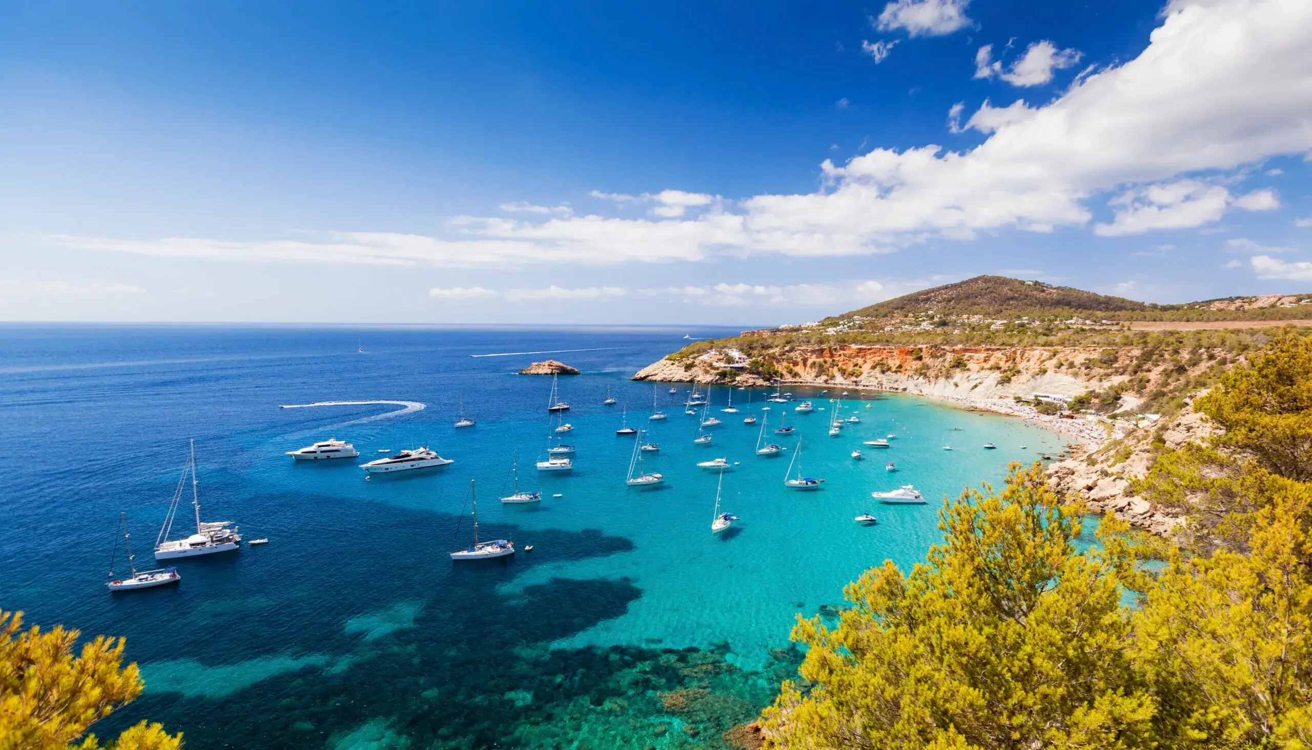 A landscape image of a seaside view in Ibiza