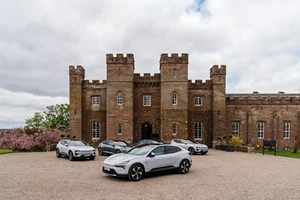 Many cars outside one of the castles