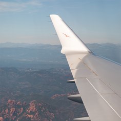 A VistaJet plane flying over the  