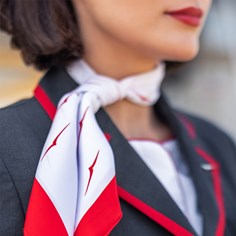 Close up of VistaJet Cabin host uniform