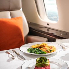 Private Dining services onboard a VistaJet flight